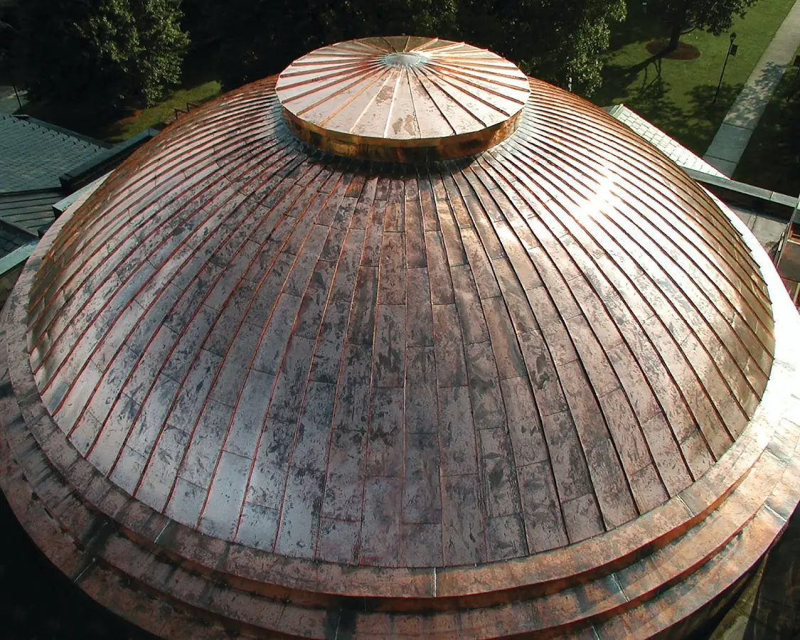 Craftsman Roofing crew installing a new roof in Downtown Manchester